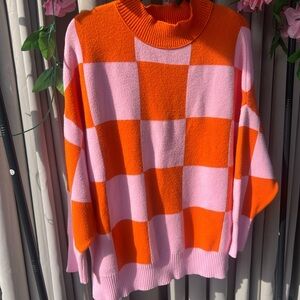 Bold Checkered Turtleneck Sweater in Orange and Pink